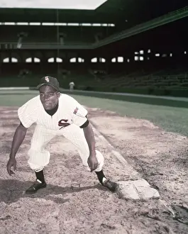 Minnie Minoso in Baseball Action Pose