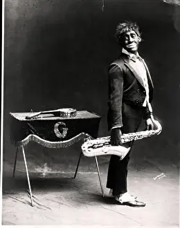 Saxophone Prints: Minstrel Performer Holding Saxophone