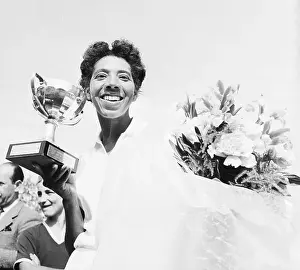 Miss Althea Gibson Holding Cup