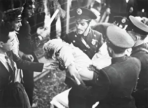 Crash Prints: Miss Helie Nice Being Carried By Officer