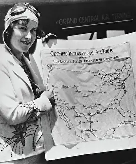 Huty31509 Prints: Miss Neville Holds The Olympic International Air Tour Map