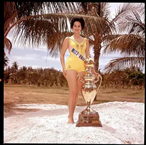 Miss Universe 1960 Poses with Trophy