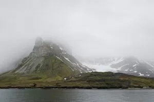 Mist veiling Alkhornet mountain, Isfjorden, Spitsbergen Island, Svalbard Archipelago, Svalbard and Jan Mayen, Norway