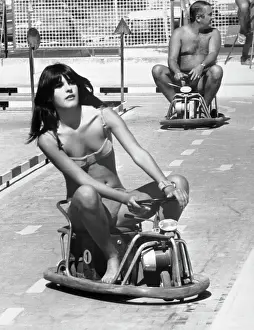 Bikini Prints: Mita Medici Rides Go-Kart in Bikini for Sunstroke