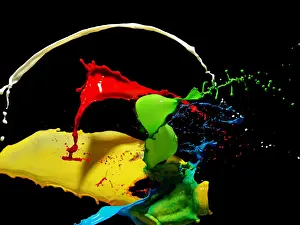 Prints of Red, yellow, white, blue and green liquids mixing on black background Stone Prints: Mixing Liquids
