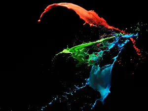 Prints of Red, blue and green liquids mixing on black background Stone Prints: Mixing Liquids