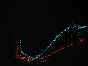 Prints of Red and Blue splash on black background Stone Prints: Mixing Liquids