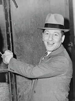Mob Boss Louis Buchalter Smiling in Hand Cuff
