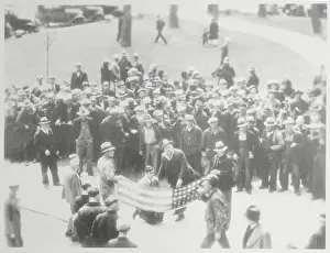 Mob Forcing Deputy Sheriff to Kiss Flag