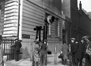Prints of 25th February 1928: Workmen transporting a giant model telephone to Olympia where it will be exhibited at the Ideal Home Exhibition. (Photo by E. Bacon/Topical Press Agency/Getty Images) Topical Press Agency Prints: Mobile Phone