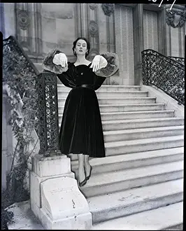 Givenchy Prints: Model In Black Velvet Gown On Stairs