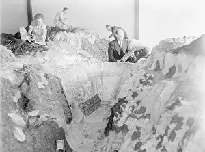 Prints of (Original Caption). This model of the Boulder Dam is being constructed in Los Angeles for exhibition at the California Pacific International Exposition in San Diego A Timeless Collection of Hoover Dam Photography: Model of Boulder Dam Being Assimilated for Show