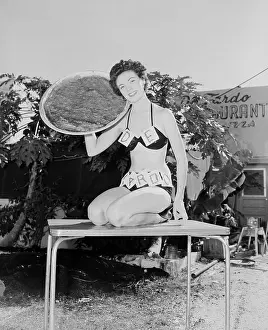 Bikini Prints: Model Holding Pizza Pie