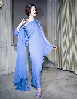 Glamour Prints: Model Posing in Athenian Style Blue Chiffon Gown
