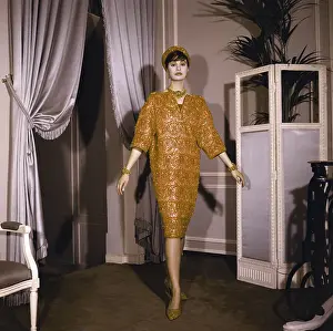 Model Posing in Chanel Cardigan Suit