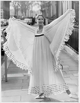 Delicate Prints: Model Posing in Dress on Street