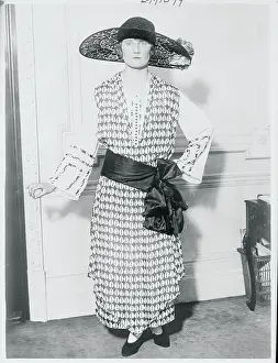 Delicate Prints: Model Posing in Feminine Dress and Hat