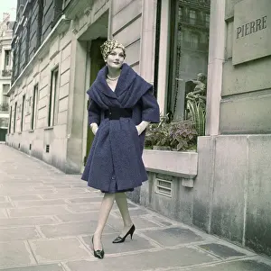 Model Posing in Purple Coat