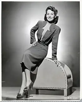 Model Posing in Waist Belted Dress