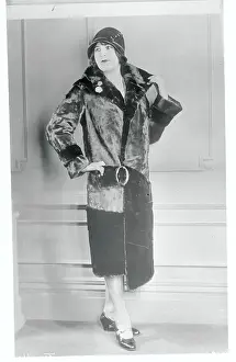Model Posing in Wrap Fur Coat