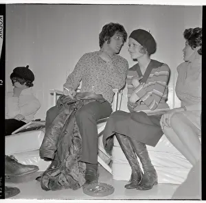 Model Twiggy and Her Agent at a Press Conference