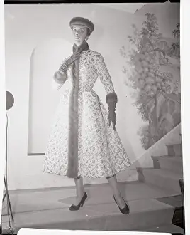 Mink Prints: Model Wearing Exquisite Gown