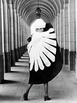 Prints of A model for Eurofur of Padua shows off a Russian wolverine cape with a matching hat at the Savoy Hotel, London, England, May 1971. (Photo by Underwood Archives/Getty Images) Fashion Trends Through Time Prints: Model Wearing Fur Cape