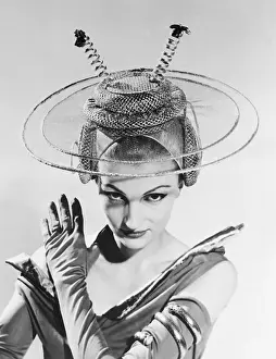 Model Wearing a Futuristic Hat for Brides