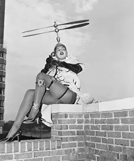 Womens Fashion Prints: Model Wearing Heli-Hat and Parachute Coat