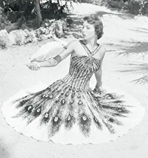 Peacock Prints: Model Wearing Peacock Print Dress by Marjae of Miami