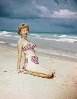 Miami Prints: Model Wearing Red and White Bikini on Beach
