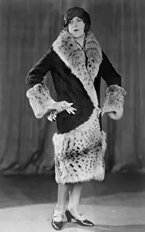 Model Wearing Trimmed Fur Coat