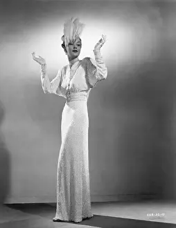 Model in White Evening Gown in Studio