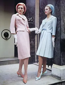 Light Blue Prints: Models Posing in Pink and Blue Wool Suits