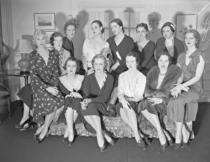 Models Sitting on Couch