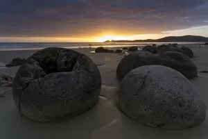 Images Dated 21st January 2013: Moeraki Boulders on the beach at sunrise, Moeraki Beach, Hampden, Otago Region, New Zealand