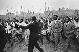 Moise Thsombe Walks W/Warriors W/Spears