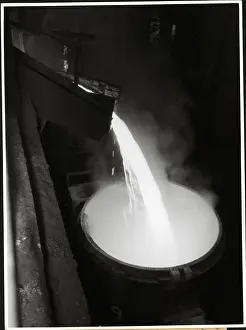 Molten Steel Pours Into Drum