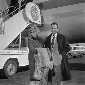 Monica Vitti and Michelangelo Antonioni Standing by Airplane