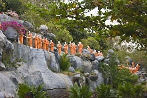 Images Dated 8th February 2012: Monk sculpture on the hill at Dambulla Cave Temple