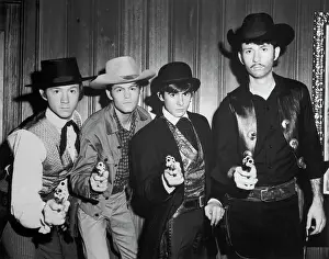 The Monkees Dressed as Cowboys