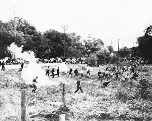 Monroe Strikers Routed by Gas Bombs