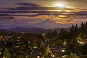 Cloudy Sky Collection: Full moon rising over Mt Hood in Happy Valley Oregon