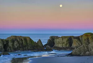Images Dated 1st January 2000: Full moon over sea stacks on beach at sunset, Bandon, Oregon, USA