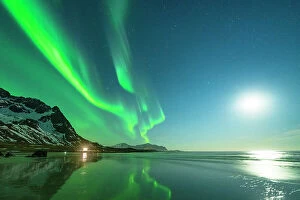 Northern Lights: A Dance of Colours Collection: Moonlight over Skagsanden beach under Northern Lights