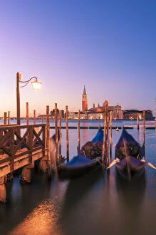 Images Dated 6th September 2015: Moored gondolas in St Marks basin at sunrise. Venice, Veneto, Italy