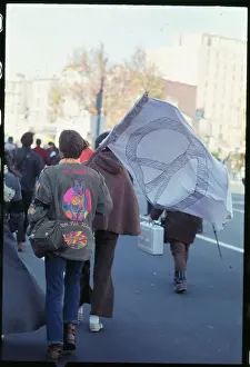 Moratorium Demonstrator Carrying Peace Sign Flag