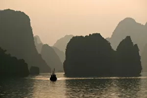 Images Dated 26th November 2009: Morning Light over Halong Bay