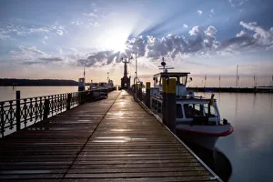 Break Of Dawn Gallery: Morning light in the harbor of Konstanz with Imperia and ships, Lake Constance