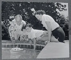 Moss Hart and Kitty Carlisle Playing with Their Children